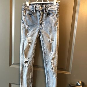 American Eagle light wash destroyed jeans Size 2